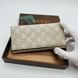 Gucci Guccissima Embossed GG Leather Wallet